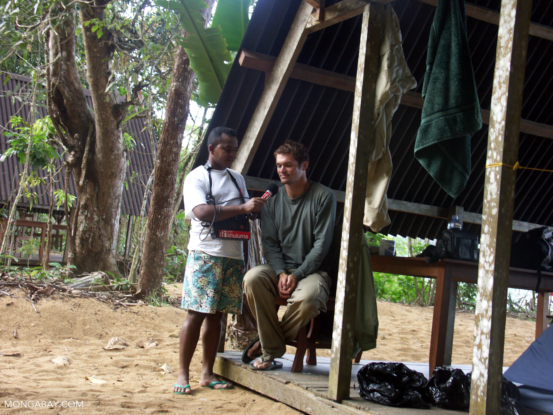 A Malagasy journalist conducting an interview in Madagascar.